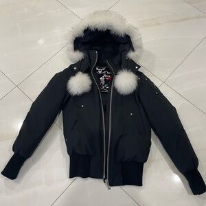 Black Moose Knuckles with white fur